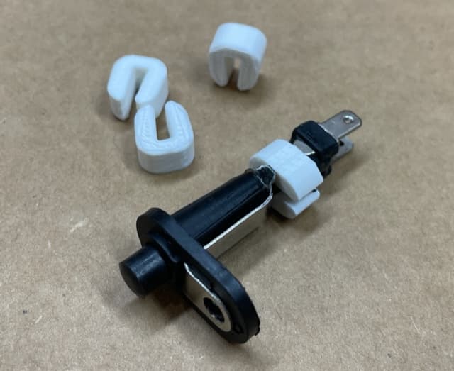 Courtesy-Light Switch Hold-Open Clip